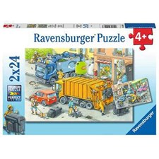 Müllabfuhr und Abschleppwagen