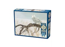 Schneeeule auf dem Ast